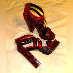 Red snakeskin heels never worn